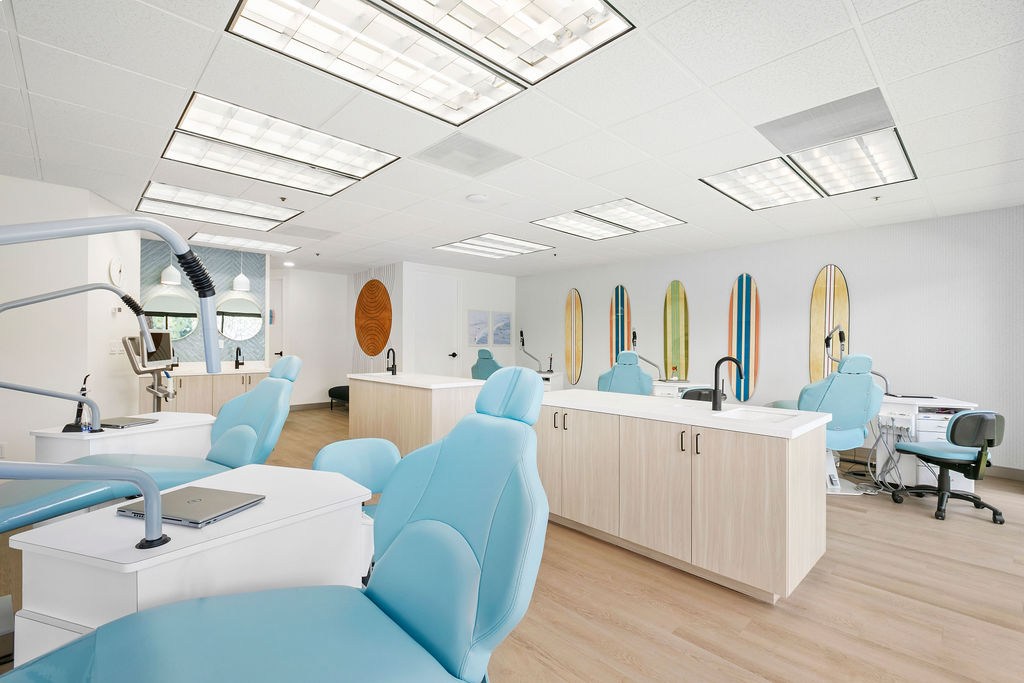 Open exam room with dental chairs